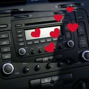 red heaarts floating out of car radio.